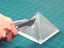 Pyramid Shaped Blade Disposal Case with Blade Snapper